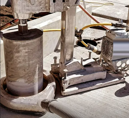 Core drilling with slurry ring on the slab